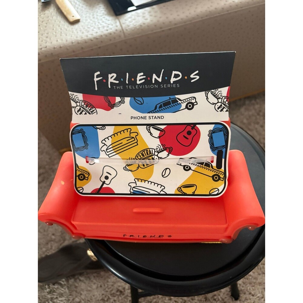 Friends TV Show Central Perk Orange Couch Silicone Phone Stand - Brand New